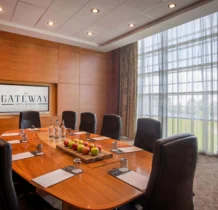 Elegant conference room with a polished table, ready for a business meeting at The Gateway Hotel Dundalk.
