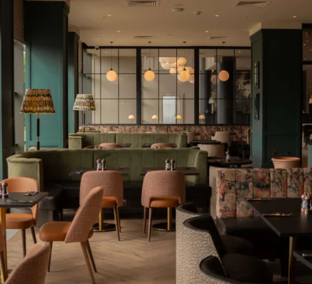 A cosy family dining area in The Gateway Hotel Dundalk with plush seating and elegant lighting.