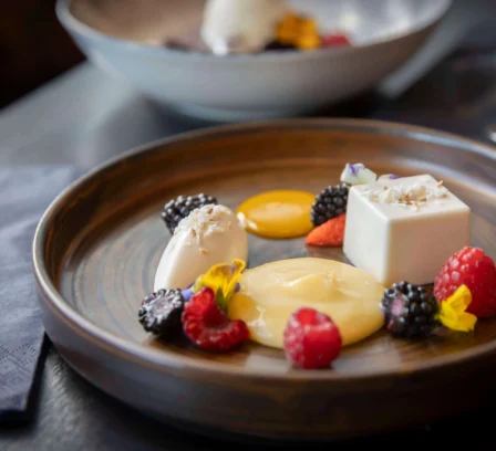 Elegant dessert arrangement with berries and cream at The Gateway Hotel Dundalk.