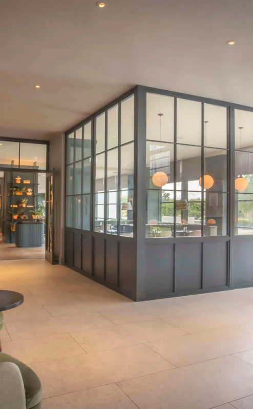 Modern lobby at The Gateway Hotel Dundalk with cosy seating and natural light.