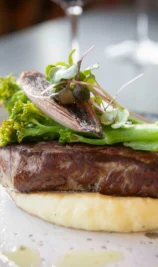 Gourmet steak with mash and greens at The Gateway Hotel Dundalk restaurant.