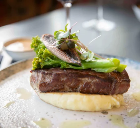 Gourmet steak with mash and greens at The Gateway Hotel Dundalk restaurant.