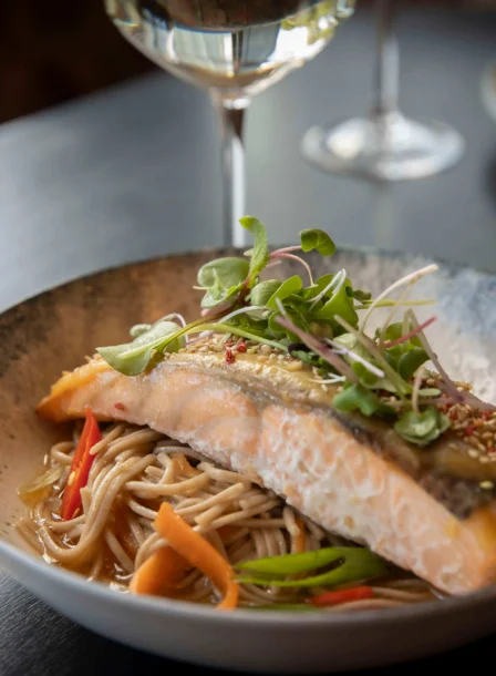 Elegant dining with a salmon dish and wine at The Gateway Hotel Dundalk.