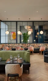 Family dining in a stylish, modern restaurant at The Gateway Hotel, Dundalk.
