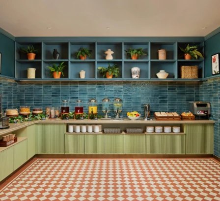 Elegant hotel breakfast area with buffet and stylish decor.